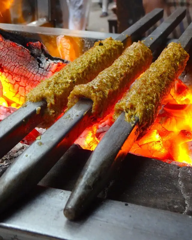 Seekh kebabs on a charcoal grill